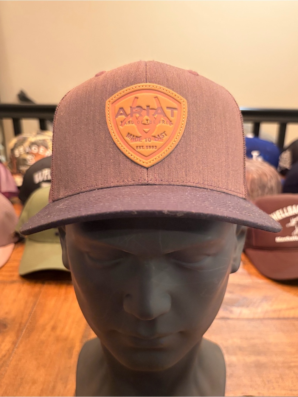 Ariat Navy Cap with Tan Leather Shield Patch